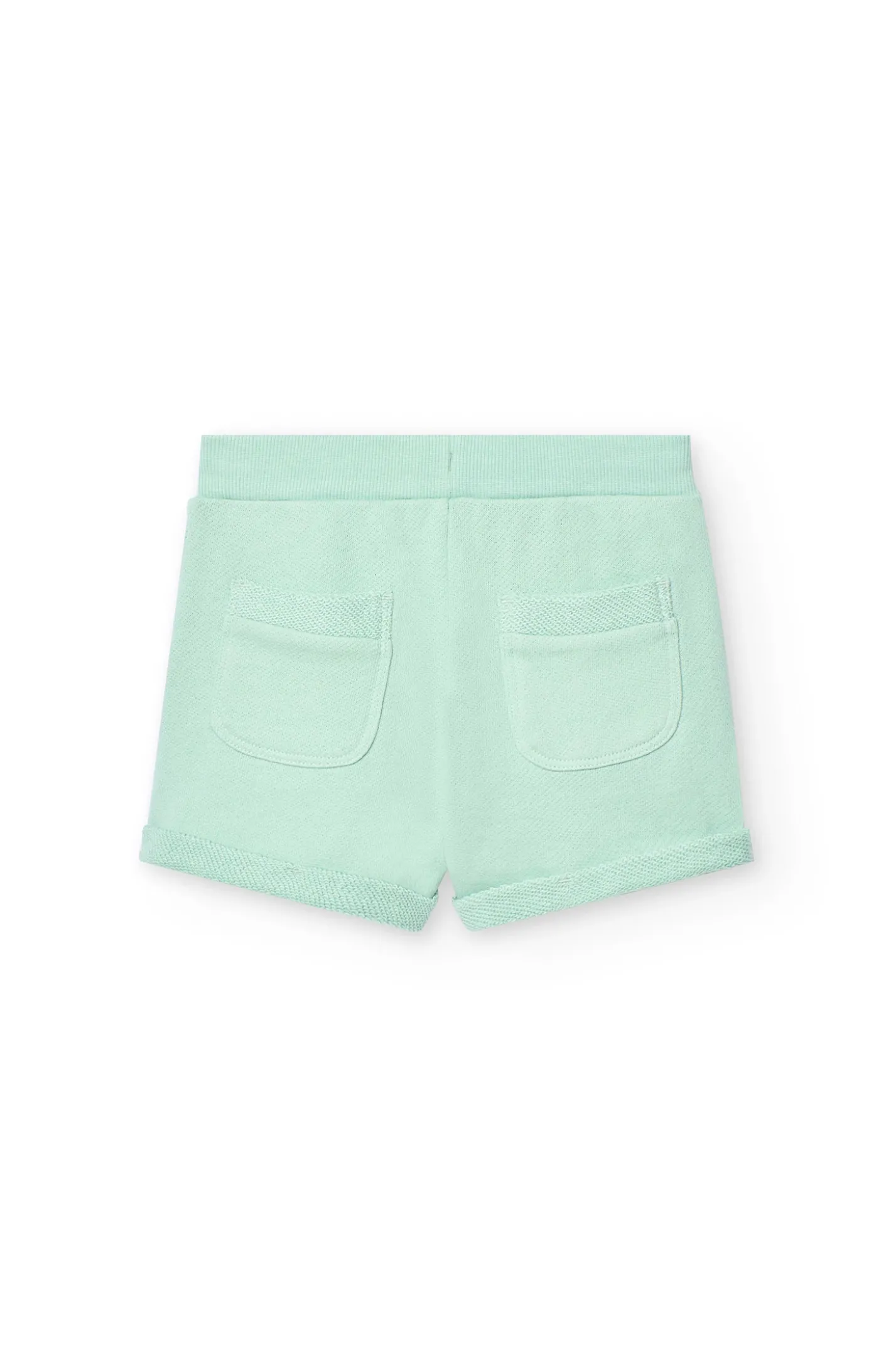 Shorts in felpa per bambina di colore verde.
