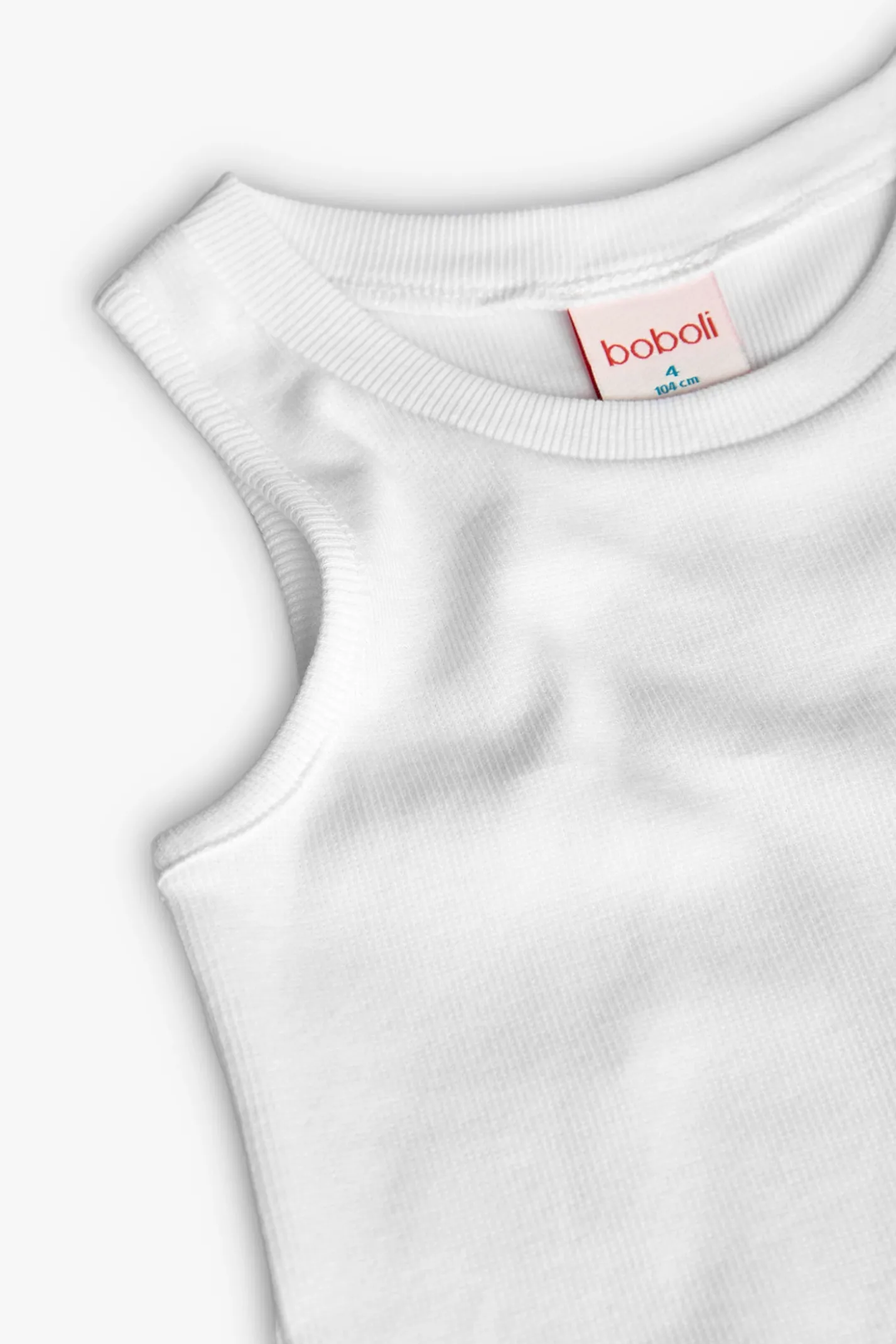Top base in maglia per bambina di colore bianco