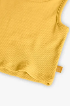 Top basicamente in maglia per bambina di colore giallo