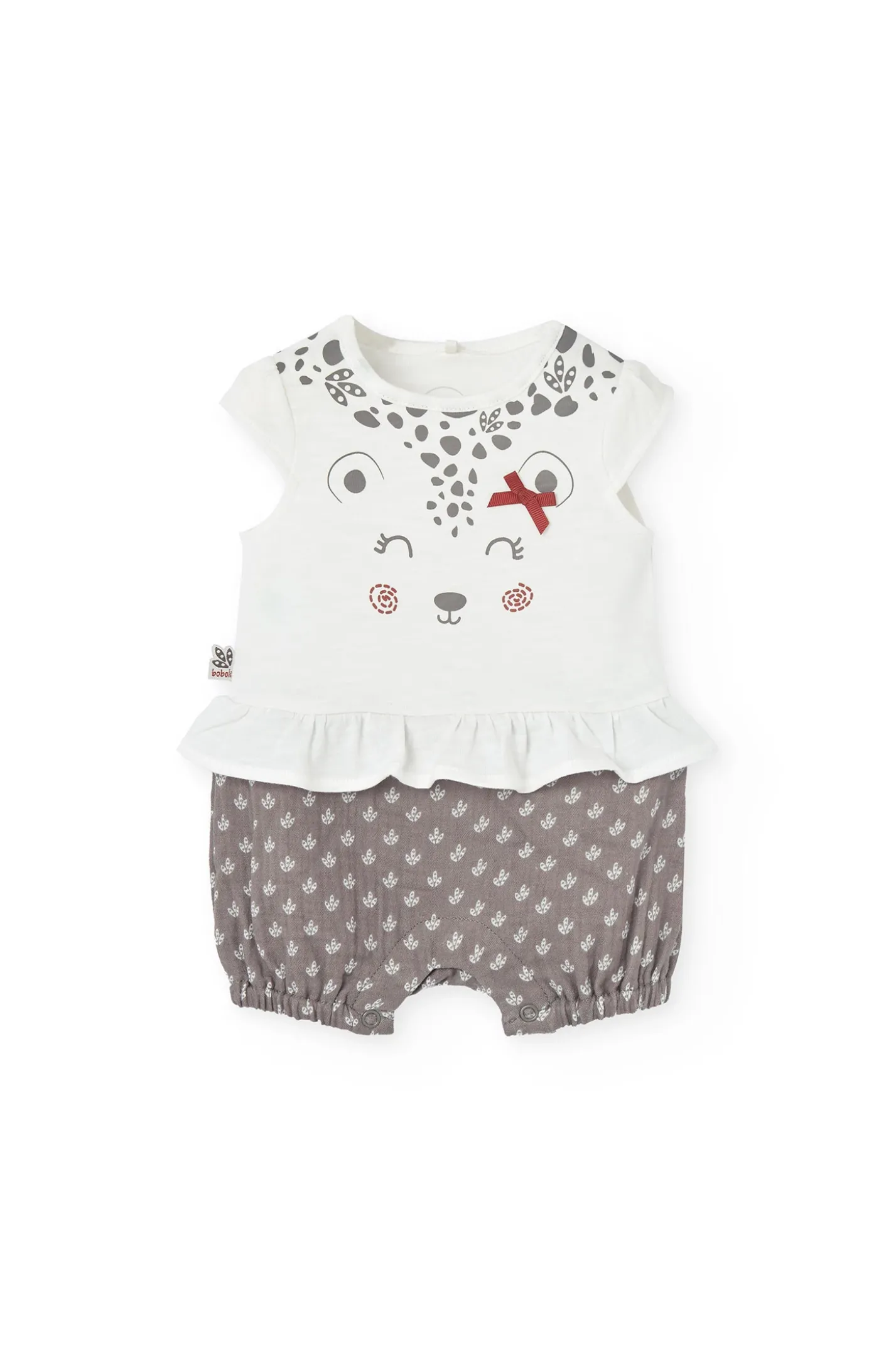 Tutina in maglia per neonata in bianco combinato