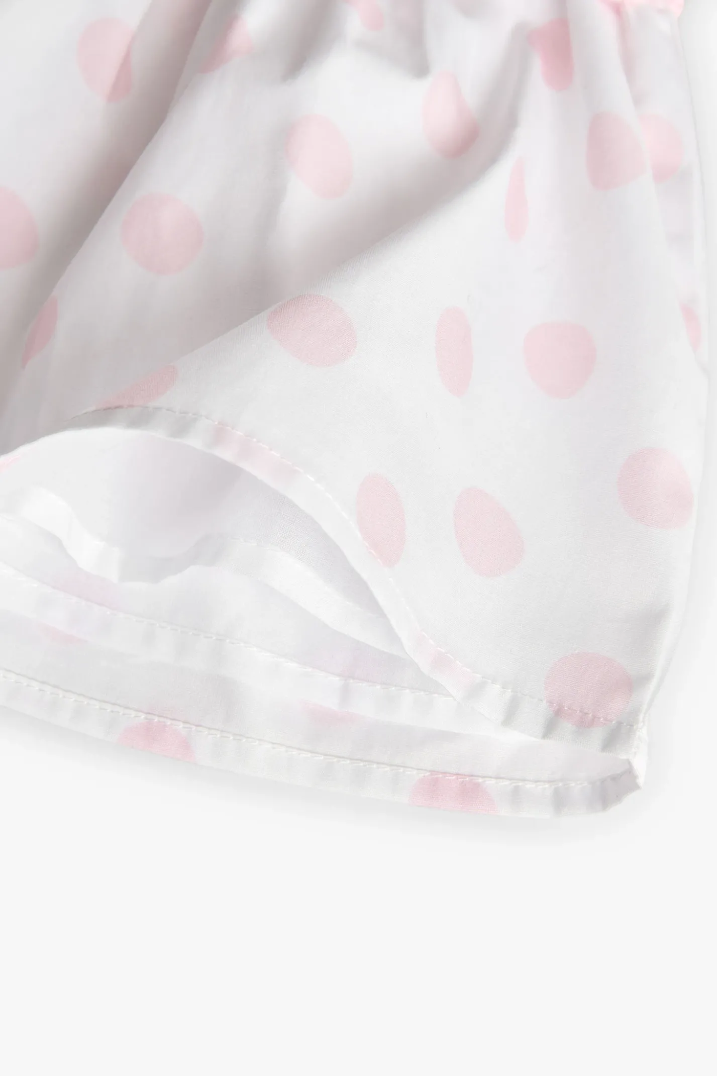 Vestito in maglia per neonata di colore rosa